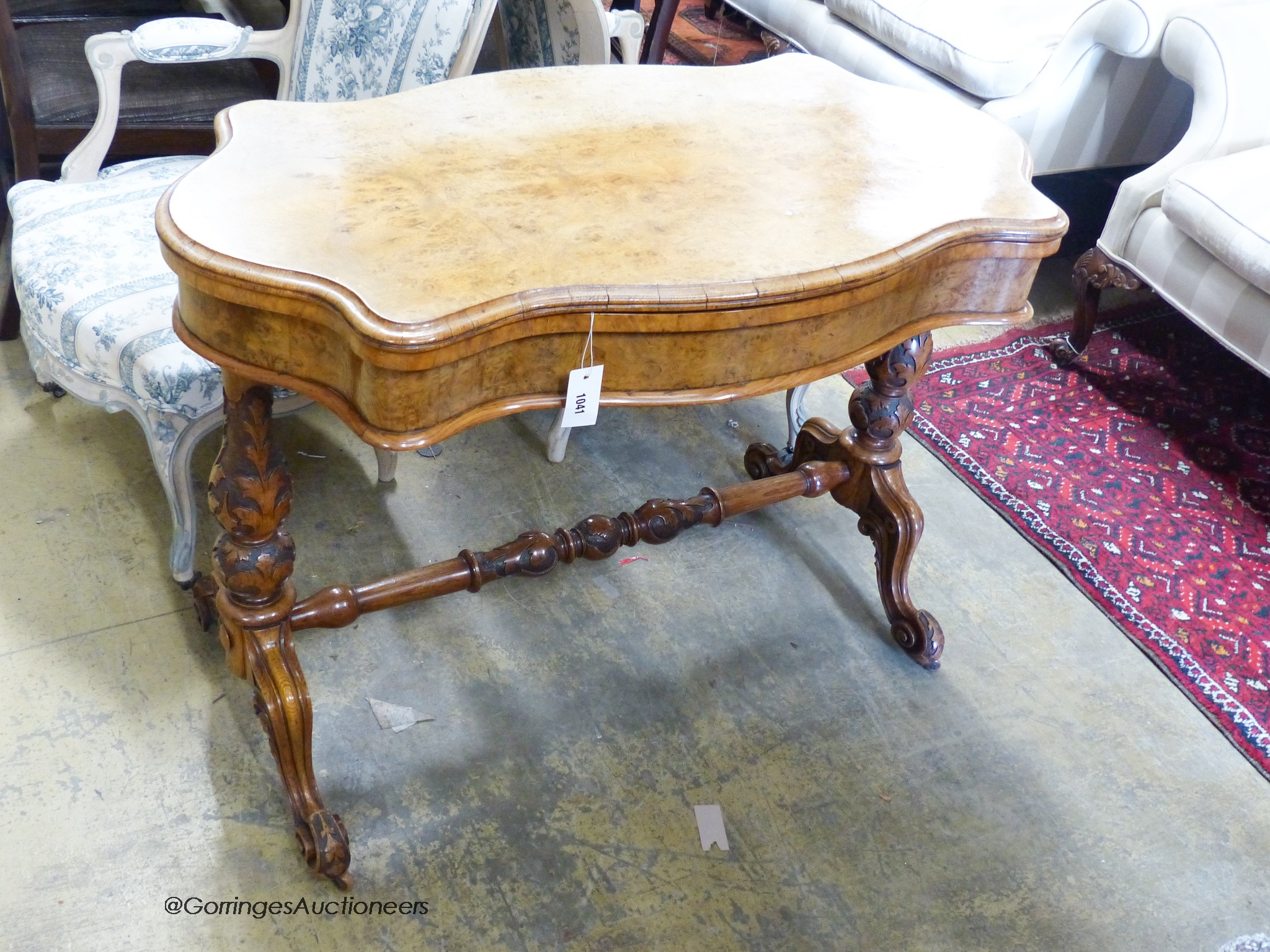 A Victorian pollard oak folding card table of rectangular serpentine form (faded) W-108, D-58, H-76cm.